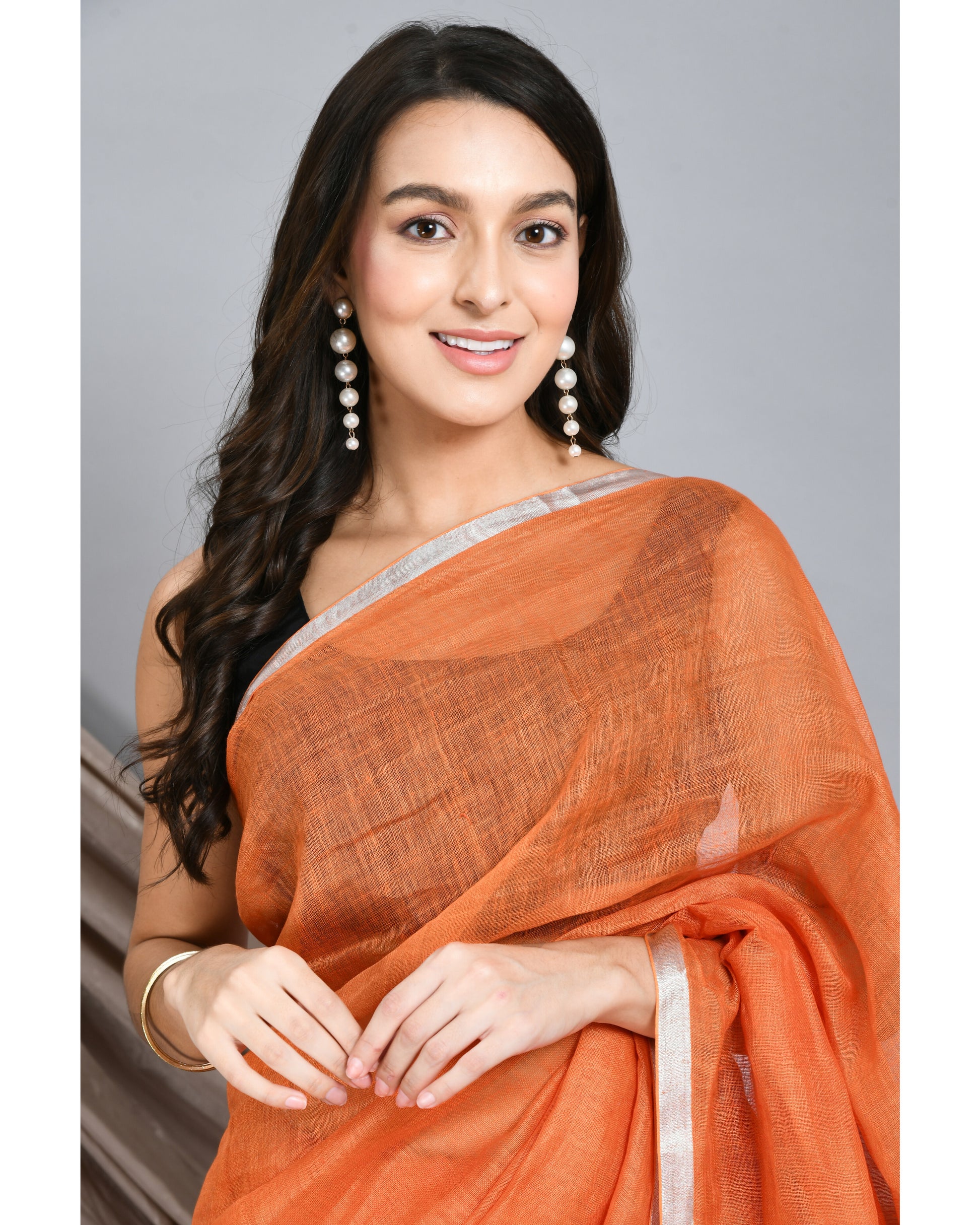 Orange Handwoven Linen Saree with silver hand spun zari border and stripes on Pallu - Swapna Creation
