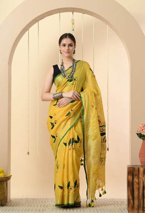 Handwoven yellow linen saree with Maa Durga embroidery and contrast green piping