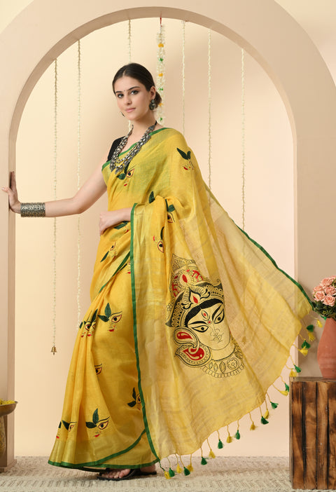 Yellow linen saree pallu with large embroidered face of Maa Durga and thread tassels