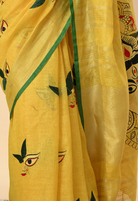Digital embroidered Maa Durga face motifs on yellow linen saree fabric