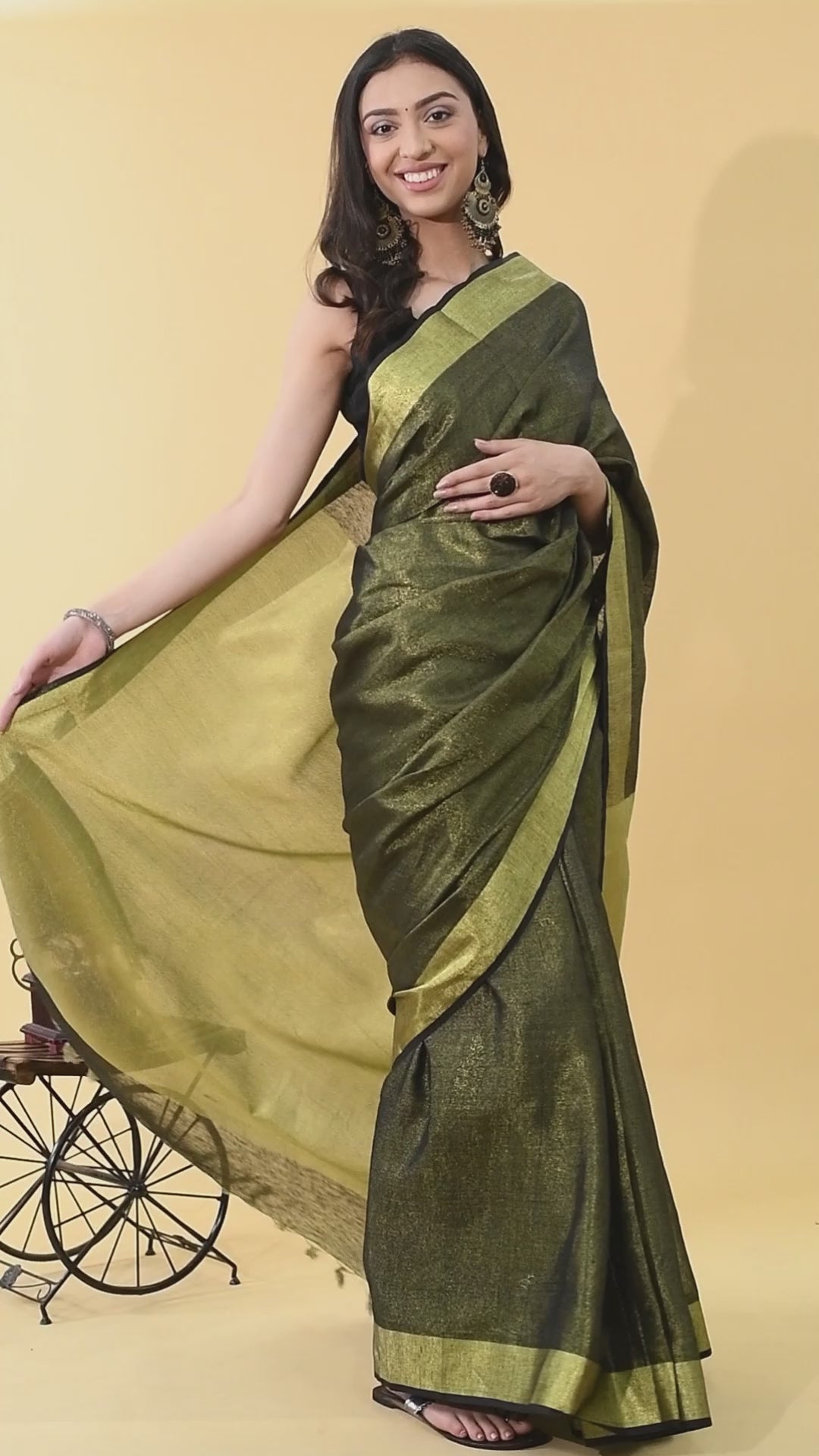 Swapna Creation Black Tissue linen Saree With Golden Zari Border