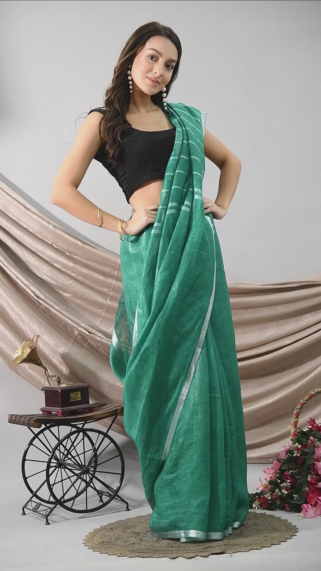 Swapna Creation Green Handwoven Linen Saree with silver handspun zari border and stripes on Pallu