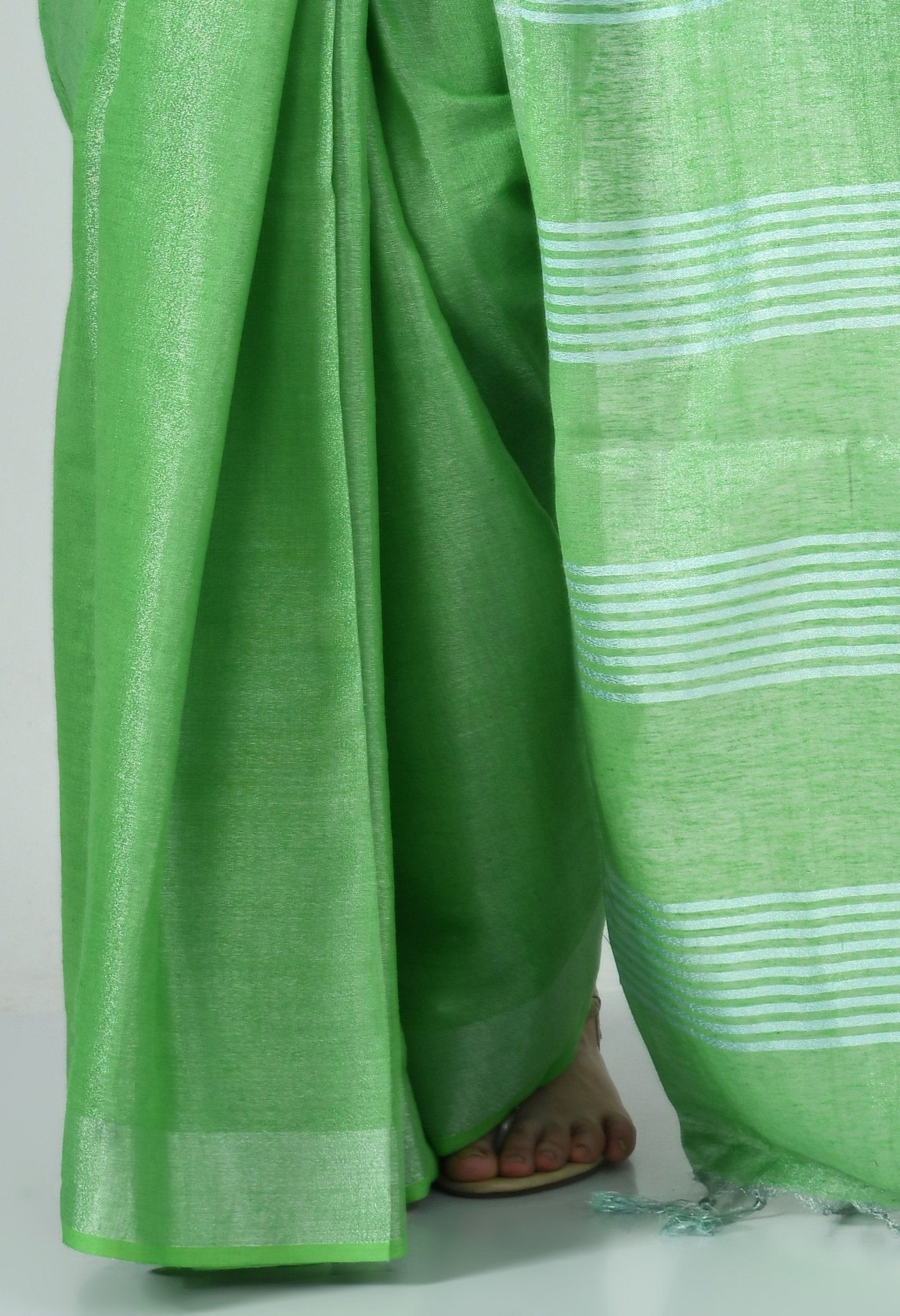 Light Green Tissue linen Saree With Silver Zari Border - Swapna Creation